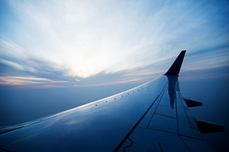 plane-wing-blue-sky