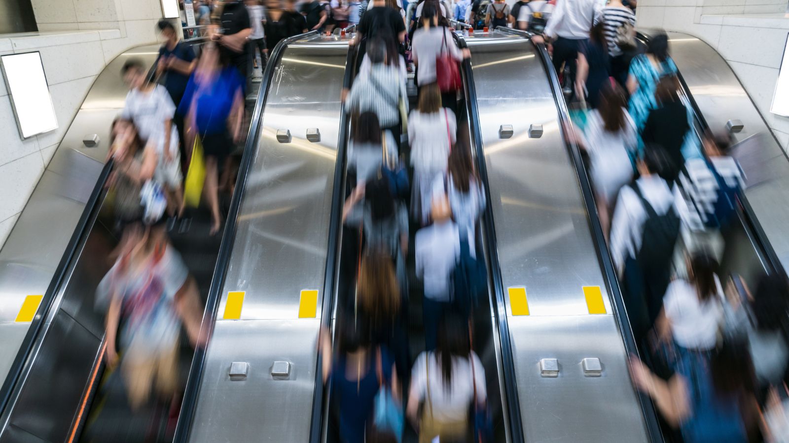 People on escalator